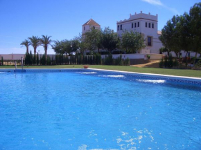 Гостиница Hacienda Los Jinetes  Кармона